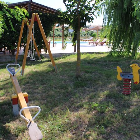 Aggelina S Apartments Xi Beach Bagian luar foto