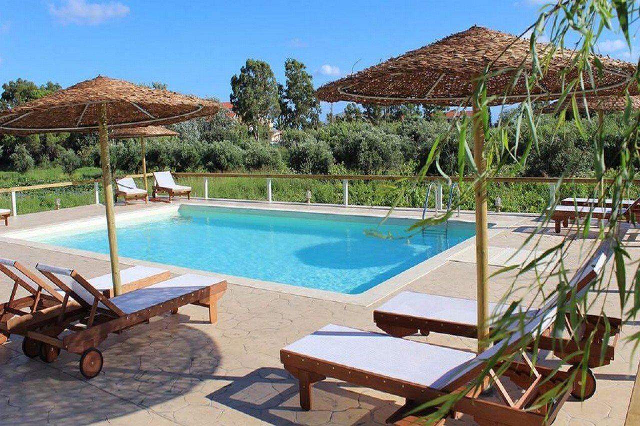 Aggelina S Apartments Xi Beach Bagian luar foto