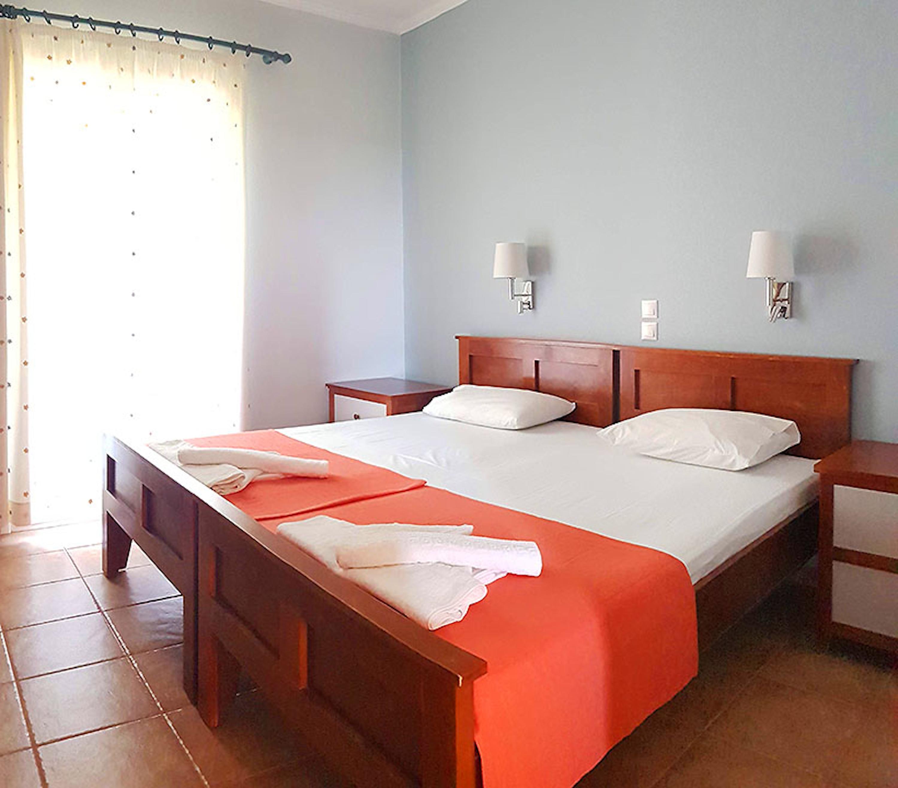 Aggelina S Apartments Xi Beach Bagian luar foto