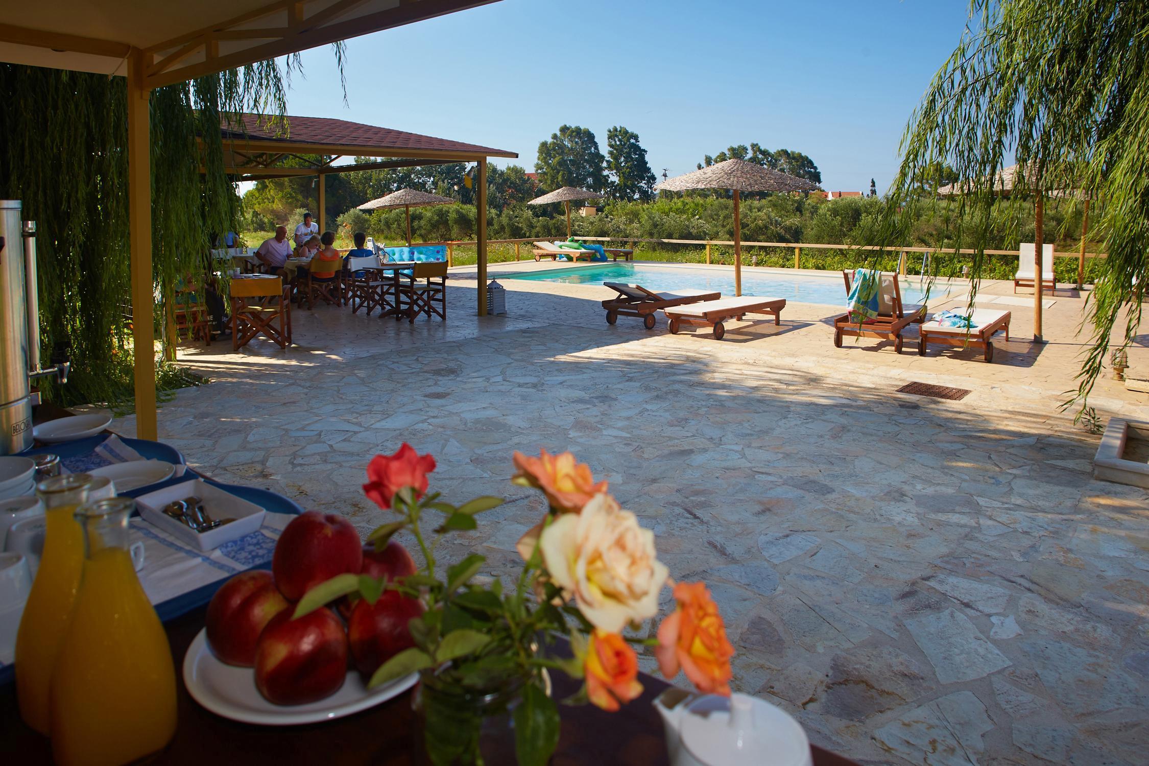 Aggelina S Apartments Xi Beach Bagian luar foto