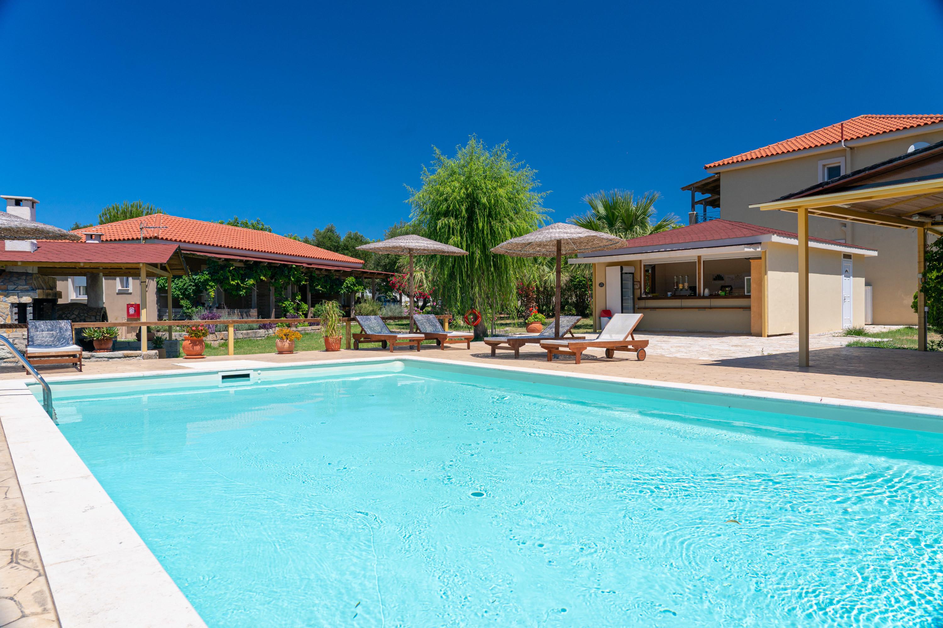 Aggelina S Apartments Xi Beach Bagian luar foto