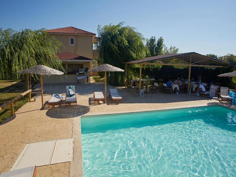 Aggelina S Apartments Xi Beach Bagian luar foto