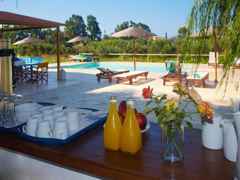 Aggelina S Apartments Xi Beach Bagian luar foto