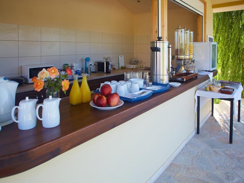 Aggelina S Apartments Xi Beach Bagian luar foto